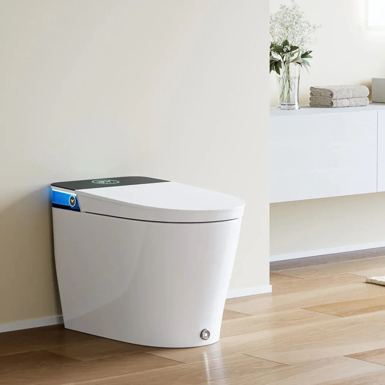 A modern, clean bathroom featuring a one-piece smart toilet with a UV-sterilized bidet nozzle for enhanced hygiene.