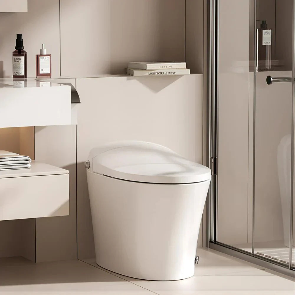 Matte white tankless smart toilet in a minimalist bathroom designed for clean aesthetics and everyday comfort