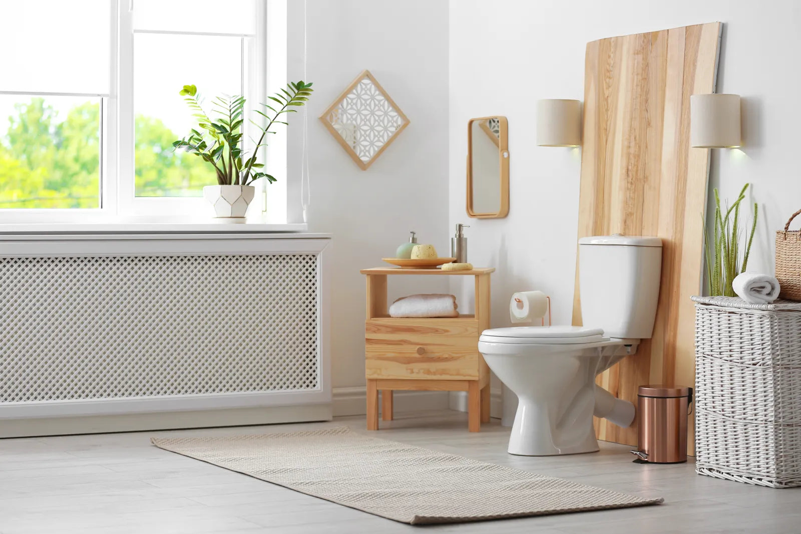 A bright California bathroom displays a modern, water-efficient smart toilet.