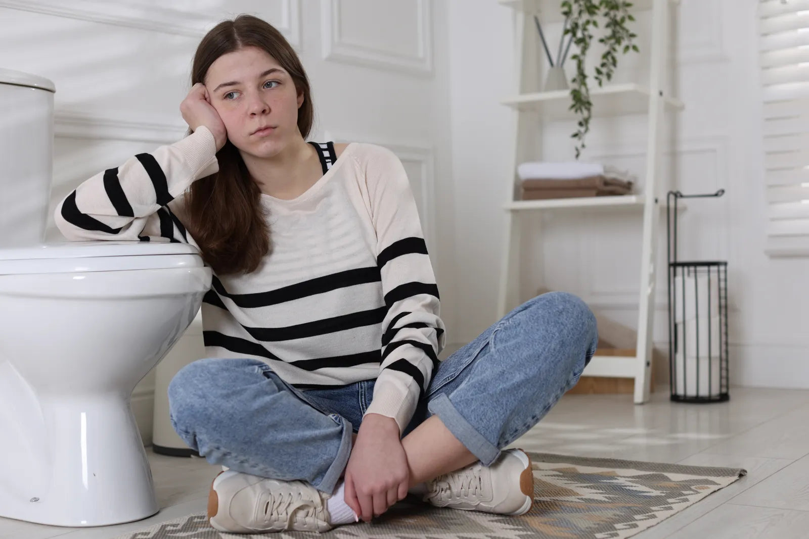 A homeowner waits frustrated while moving her smart toilet to a new home.