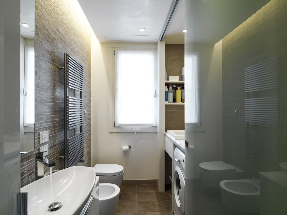 Compact toilet installed in a narrow residential bathroom