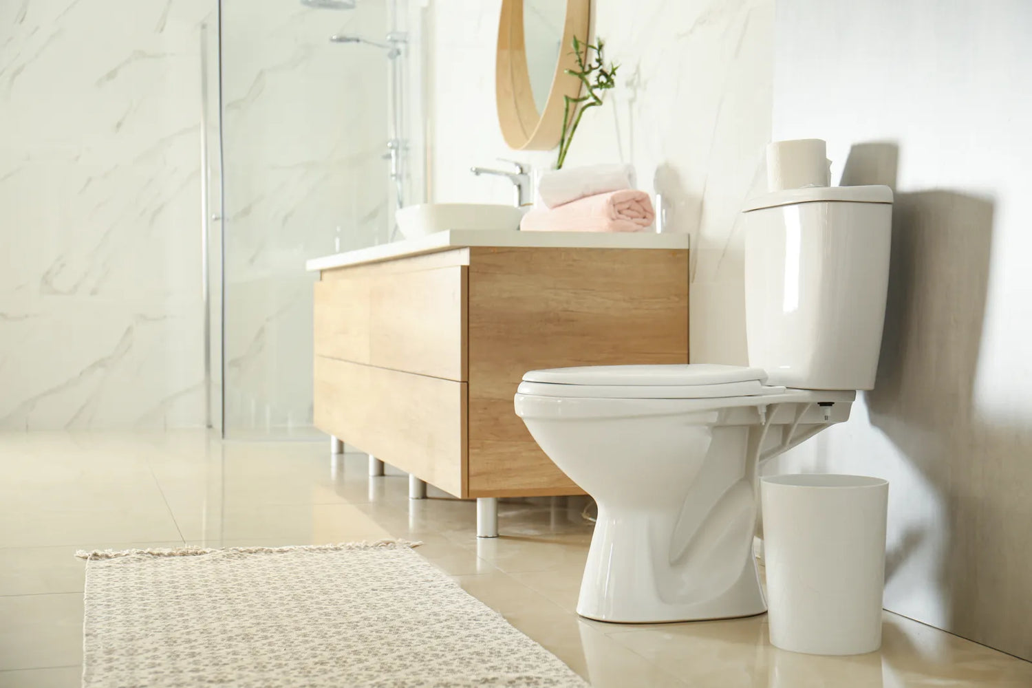 A modern bathroom displays a traditional toilet for daily use.