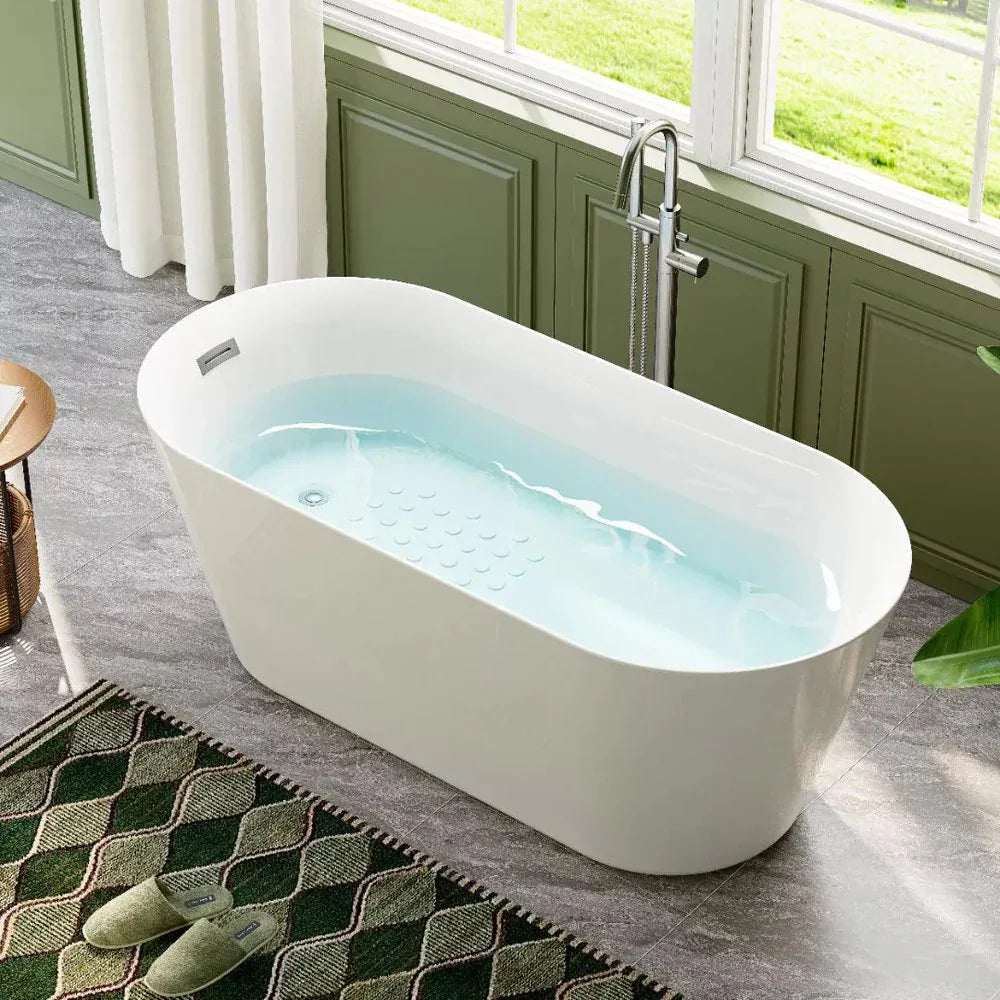 Freestanding white oval bathtub with massage jets in a bright bathroom, ideal for relaxing, therapeutic soaking.