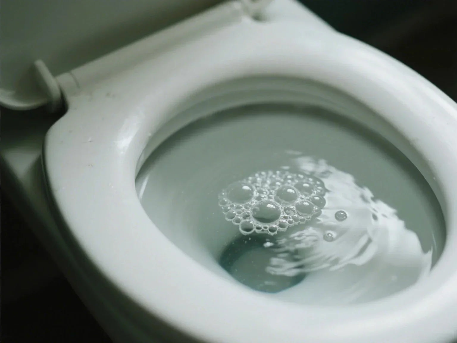 why is my toilet bubbling