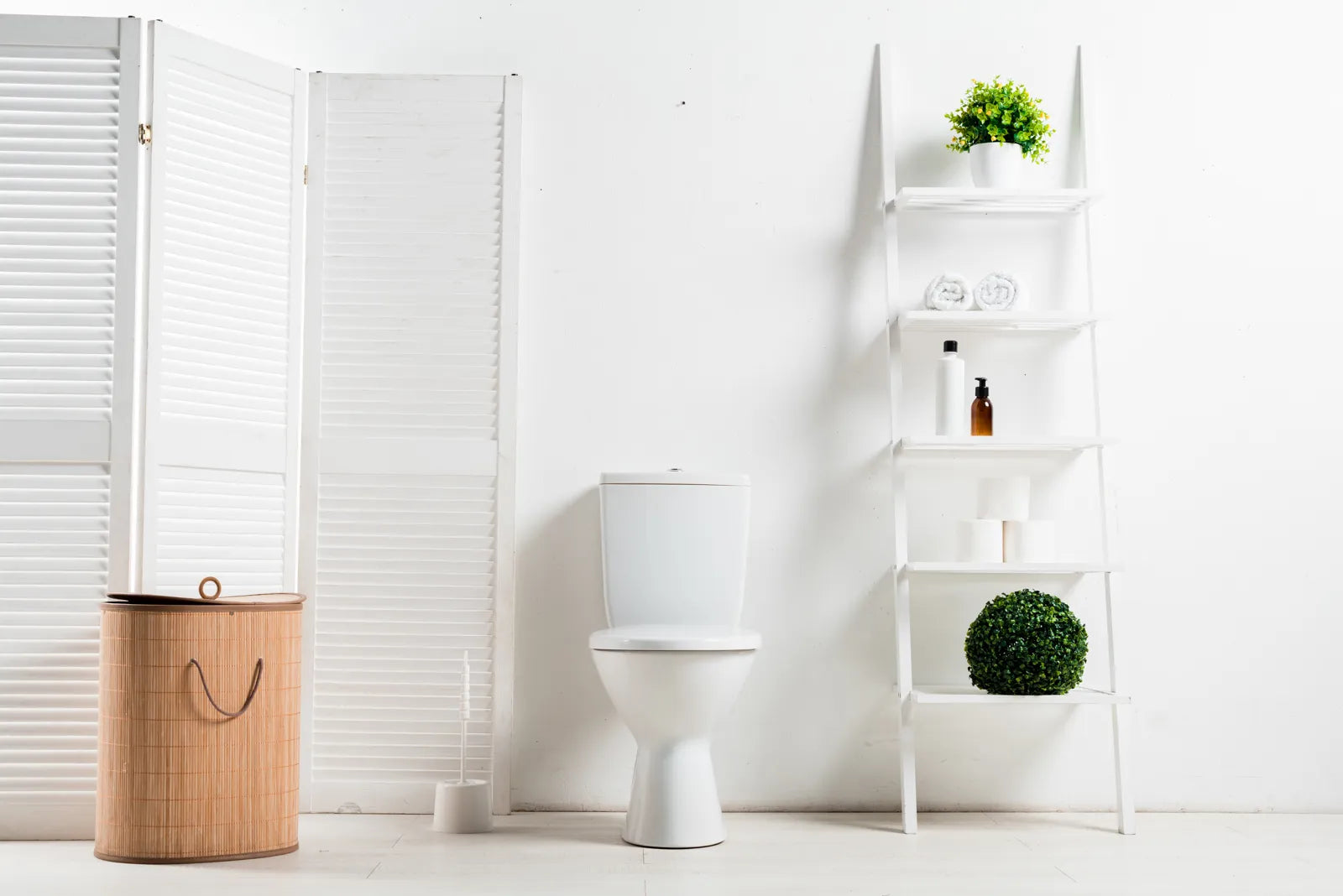 A standard-height toilet displayed in a minimalist setting, showing a common height option for home use.