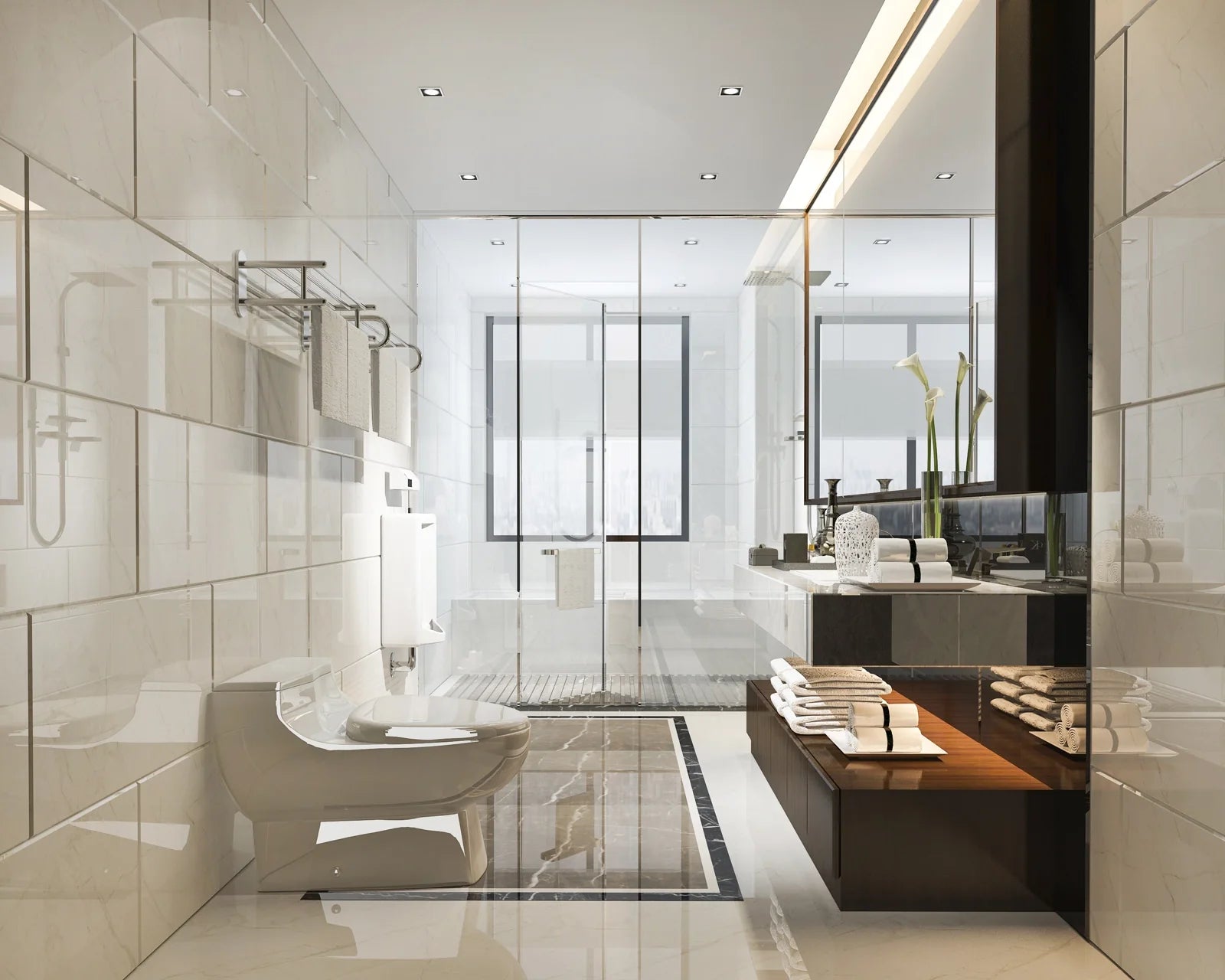 Modern bathroom with glass shower partition, bidet toilet, and vanity area, used to showcase a clean, functional layout ideal for bidet system integration.