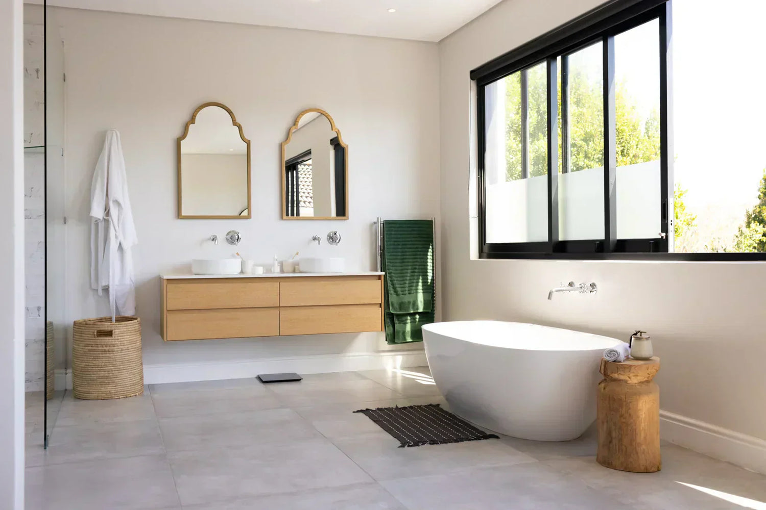 Bright bathroom with a freestanding tub, illustrating the overall setup to explain various drain system options.