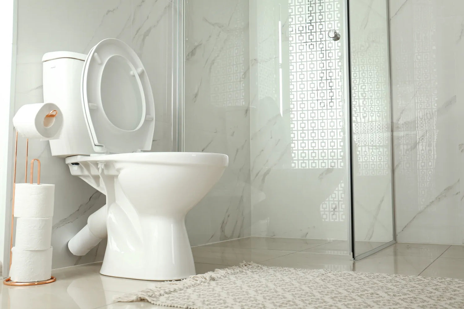 Troubleshooting Weak Flushing Toilets in Your Home – See a clean, modern bathroom toilet like the one you use every day.