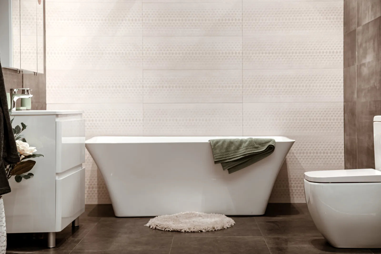 Finished bathroom with a new freestanding tub, showing the final result after removing the old bathtub.