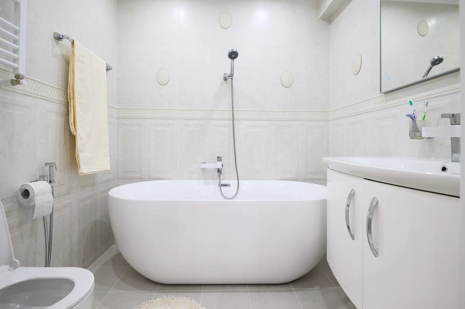 Bright bathroom with a clean acrylic tub, showcasing the ideal appearance before hard water stains and scale accumulate.